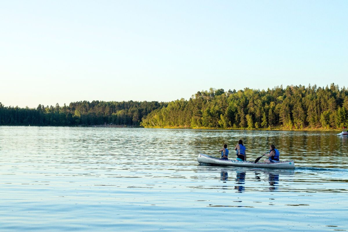 Visitors canoe on Bad Axe Lake.